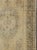 Measures: 5'7 x 9'7 This beautifully muted antique Turkish Oushak displays a stretched central medallion filled with Sub-...