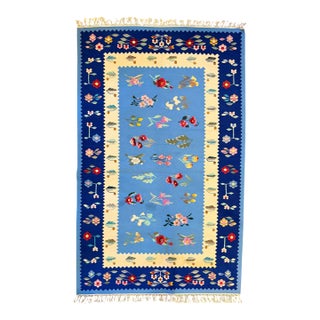 Mid-20th Century Romanian Oltenian Folk Art Floral Wool Kilim Rug in Blue and Navy For Sale