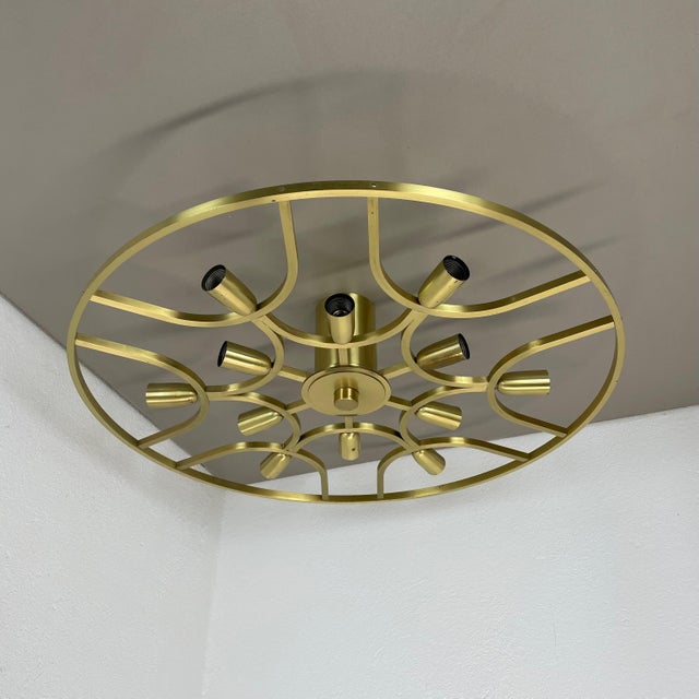 Article: large brass ceiling light, flush mount Origin: Italy Age: 1960s This vintage modernist ceiling light was produced...