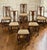 This Set of 6 Antique Queen Anne Chestnut Dining Chairs offers a wonderful balance of refinement, warmth, and...