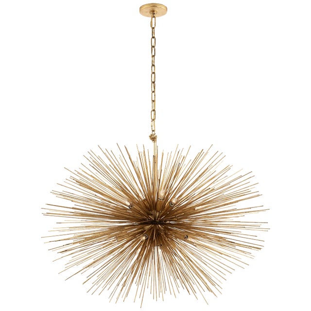 Strada Medium Oval Chandelier in Gild Designer: Kelly Wearstler Fixture Height: 26.5" Canopy: 4.75" Round Mounting: Chain...