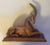 Art Deco copper clad figure of a stylized gazelle or deer on a conforming plinth, circa 1920. Light weight. Measures 9...