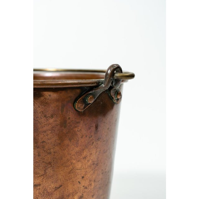 This original, handcrafted copper bucket represents traditional European metalwork from the turn of the 18th to the 19th...