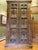 Solid wood statement armoire purchased in the late 1990s from an estate importer in Los Angeles. The piece was...