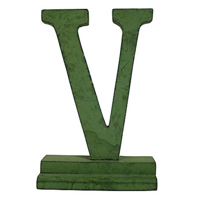 Vintage wood department store letter V in original green paint.