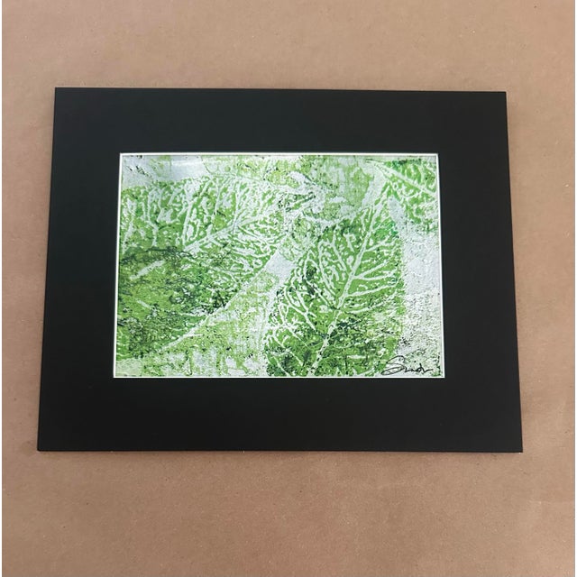 A fresh and contemporary original monoprint inspired by the intricate patterns and textures found in nature. Layered...