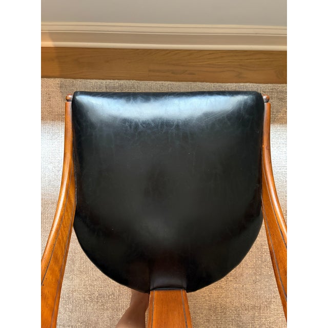 For sale is a remarkable, matching pair of authentic Mid-Century Modern neoclassical "Spoonback" slipper chairs designed...