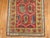 An early 20th century Caucasian Karabagh runner featuring a traditional paisley motif and floral border Measures: 3'4" x...