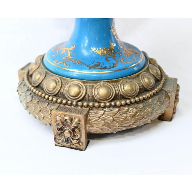 Gorgeous pair of French Sevres style porcelain floral vases Classic pair with bulbous amphora shape and large drape...