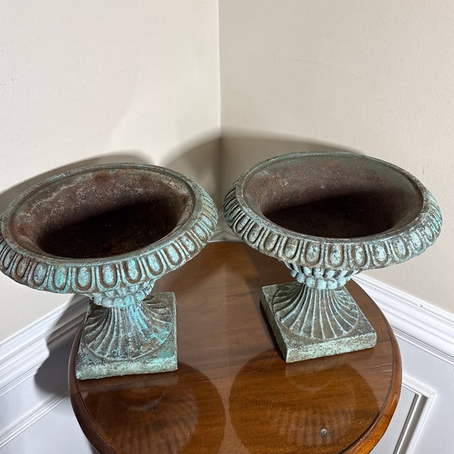 These classical pedestal urn planters feature a lovely aged green finish that gives them an authentic antique French...