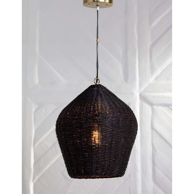 Rattan, contrasted by gold hardware, is striking on the Georgian pendant. Perfect for an eclectic abode or modern digs,...