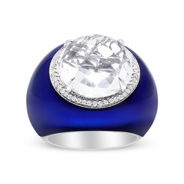 Imbued with a sense of vintage style, this 18k white gold ring features a white quartz centerpiece trimmed with a halo of...