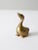 This is a mid 20th century vintage brass duck figurine. The little cast brass bird has nice detailing.