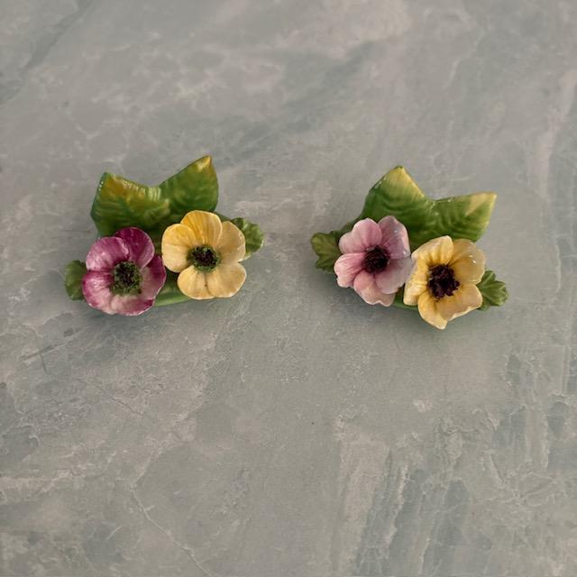 Pretty set of 12 placecard holders. Made of bone china by Coalport of England. Floral design with several different...