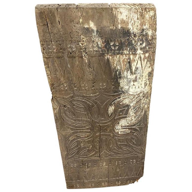Ancient hand carved architectural panel from Toraja. This carving symbolizes both the protection of the home and courage....
