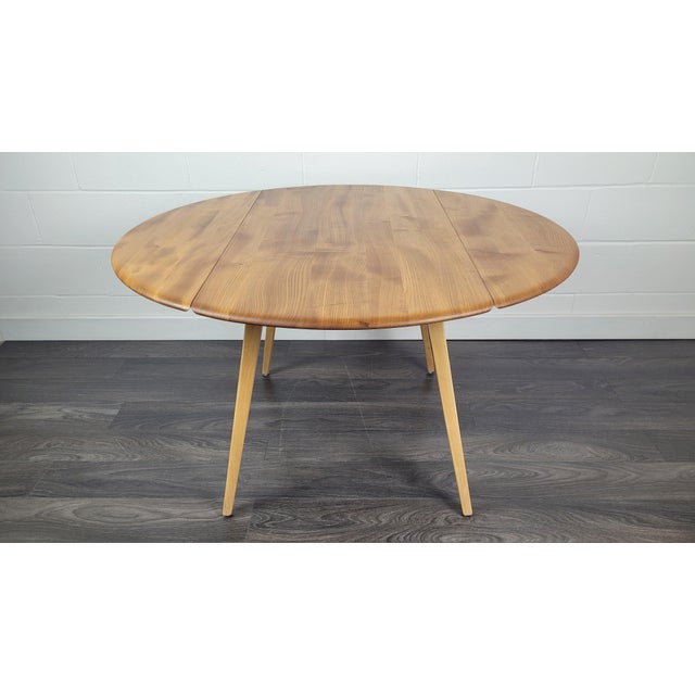 Drop Leaf Dining Table by Lucian Ercolani for Ercol, 1970s, in Restored conditions. Designed 1970 to 1979 I have official...