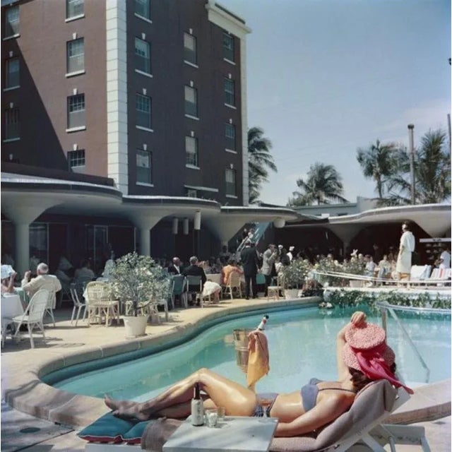 Palm Beach 1955 by Slim Aarons Slim Aarons Limited Estate Edition The pool at the Colony Hotel in Palm Beach, Florida,...