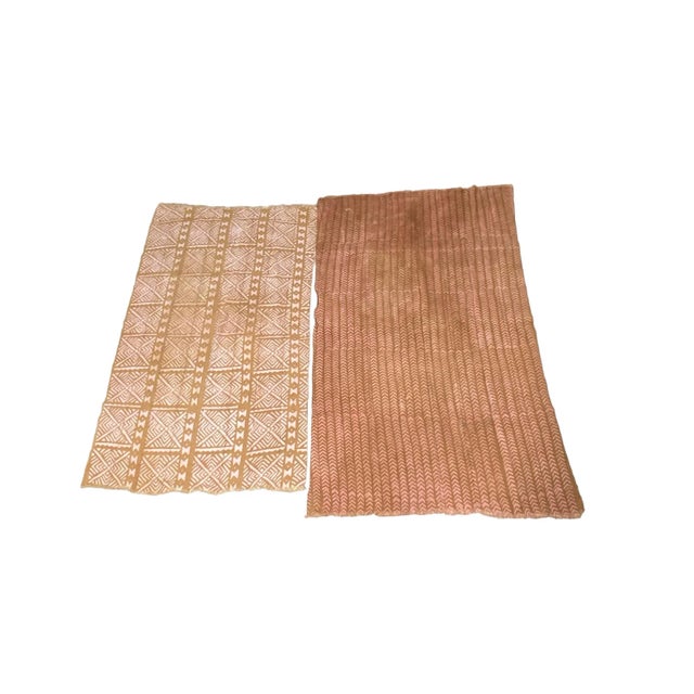 This tribal set includes two Bogolan mud cloth textiles, expertly hand woven, hand sewn, and hand dyed by the skilled men...