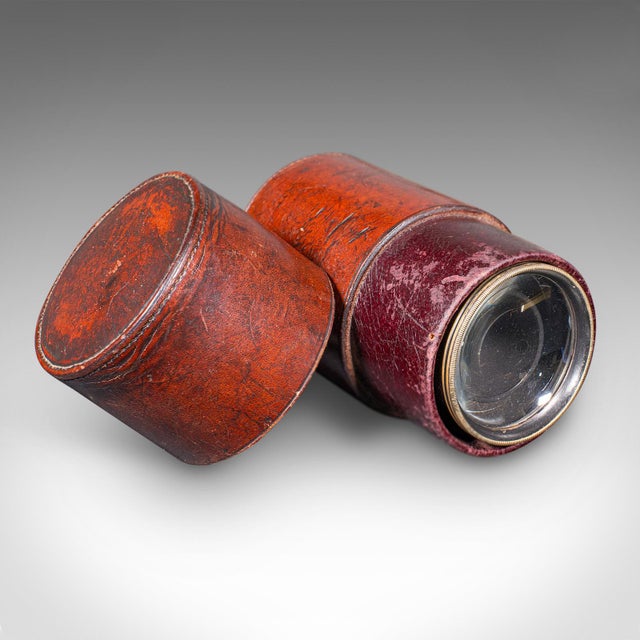 This is a small antique opera monocular. A German, brass and leather cased viewing scope, dating to the late Victorian...