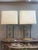 A large pair of French ' Hollywood Regency" table lamps with cream shades which are original to the lamps. The skyscraper...