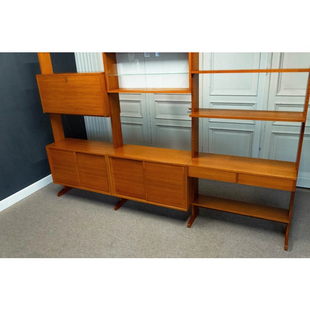 This modular teak shelving system, designed by Kajsa and Nils "Nisse" Strinning in the 1960s, is a prime example of...