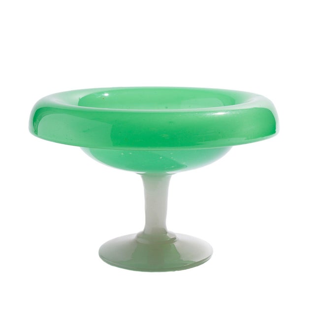 Hand blown glass compote with a jade green bowl on an alabaster opaline pedestal. Corning, New York, circa 1920....