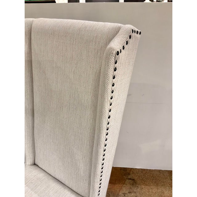 Stylish Hooker Furniture High Back Wing Host Chairs - Pair. Neutral fabric, nailheands around border, wood legs. Original...