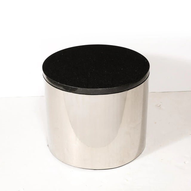 This refined Mid-Century Modern Cylindrical Drum Form Chrome and Granite Occasional Table was realized in the United...
