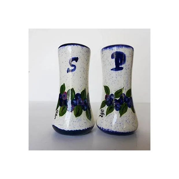 Vintage Maine potters handmade blueberries designed salt and pepper shakers. Artist signed "BS."
