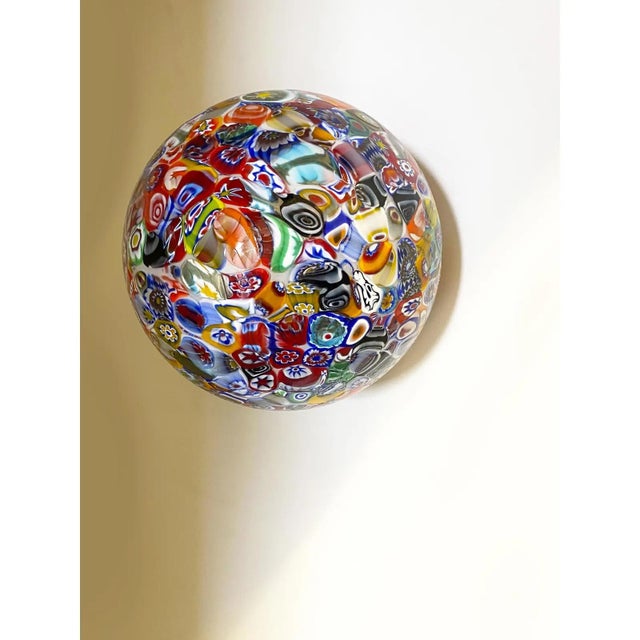 Impressive contemporary sphere in Murano glass with multicolored Murrine. Floreal design in very particular and effective...