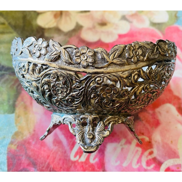 This is a beautiful silverplated on copper reticulated footed bowl, I’m not exactly sure of its purpose; perhaps for nuts...