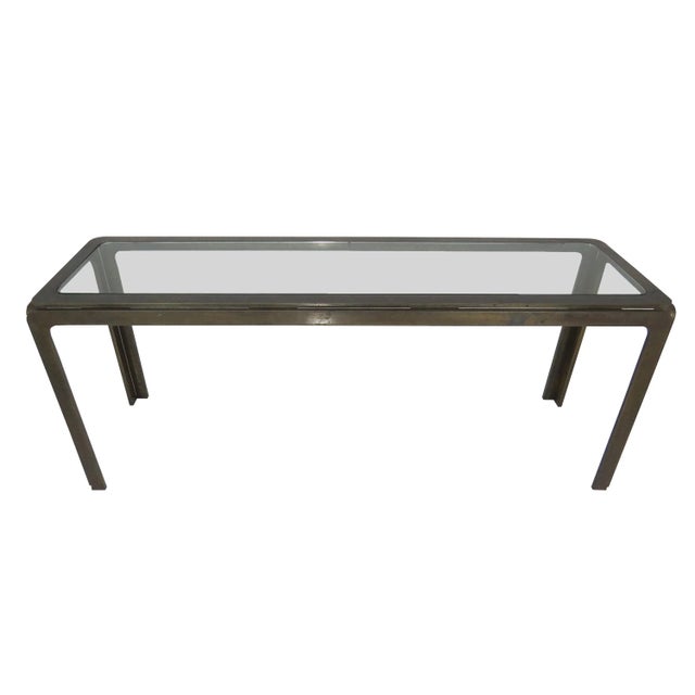 A fine vintage bronze and glass console table attributed to Roger Sprunger for Dunbar. Clean modernist lines, with an...