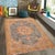 Enhance your living space with this stunning vintage Persian hand-knotted wool rug, a true showstopper that effortlessly...