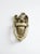 This is a vintage brass door knocker. Shaped as an American eagle perched atop a crest with swinging handle knocker....