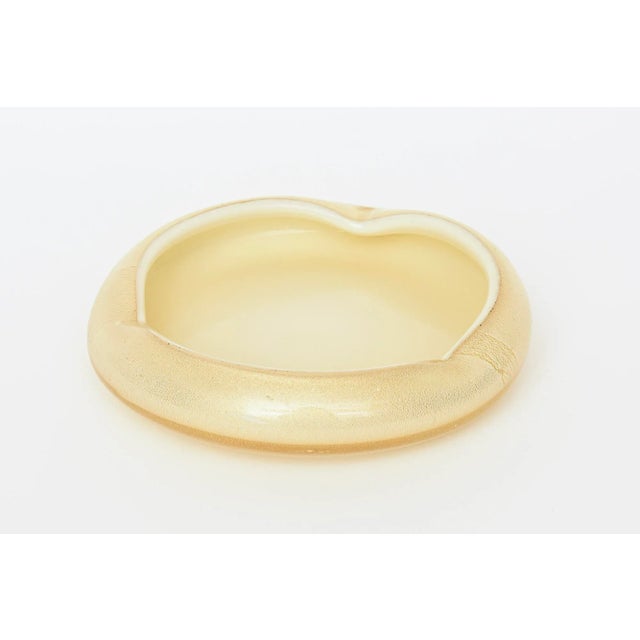 This vintage beautiful mid century modern Italian Murano hand blown low bowl is attributed to the work of Archimede Seguso...