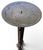 A striking pair of monumental, floor-standing wrought iron candle holders that bring an immediate architectural presence...