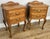 This elegant pair of Vintage French Louis bedside tables features graceful proportions and charming carved detailing...