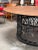 Oversized custom table that will steal the show. Reclaimed lattice circular iron base with a custom made 80" walnut top....