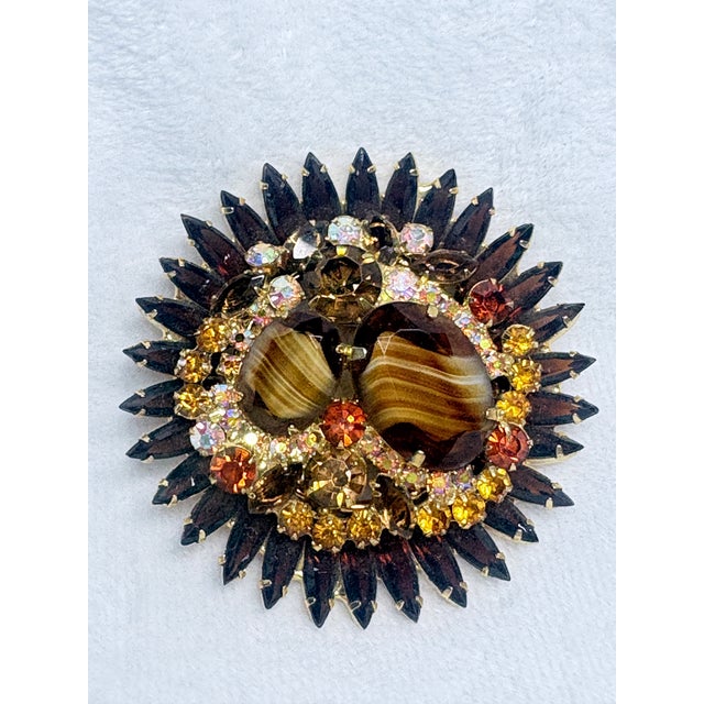 Verified Juliana (DeLizza & Elster) sunburst brooch and matching clip earrings from the mid-1960's featuring the chalk...