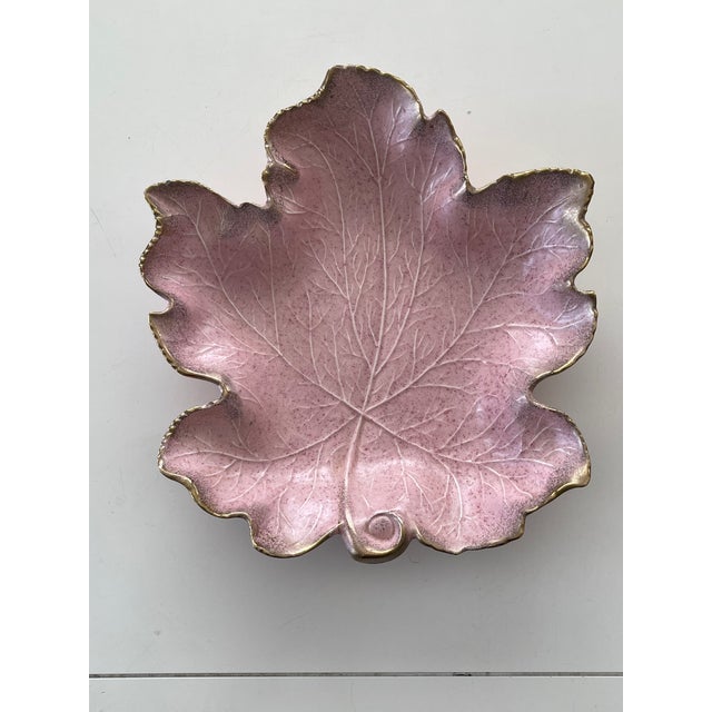 This large 1950s glazed pink and gold maple leaf serving dish is the perfect size to be displayed front and center! Hand...
