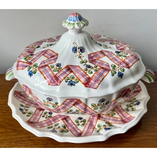 This gorgeous hand-painted vintage large faience soup tureen features a Pink ribbon design with Pink, Blue and Green...