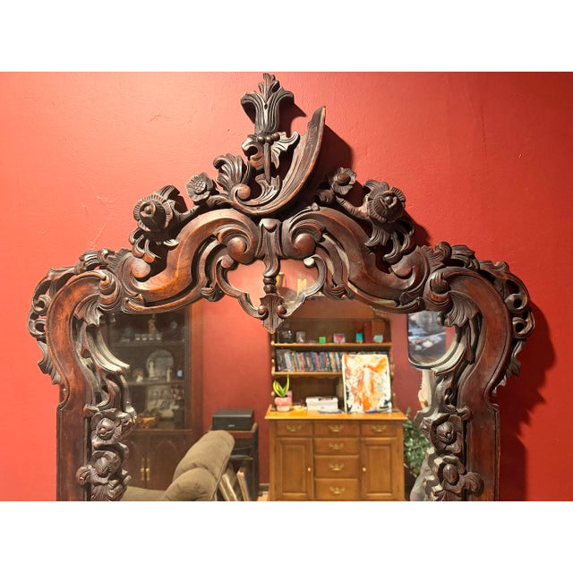 This is a contemporary Design Toscano Hapsburg marble-topped console table and matching mirror set, beautifully...