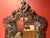 This is a contemporary Design Toscano Hapsburg marble-topped console table and matching mirror set, beautifully...