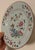 Antique 18th century Chinese export porcelain plate. Decorated in famille rose palette with peonies and a Chinese fence....