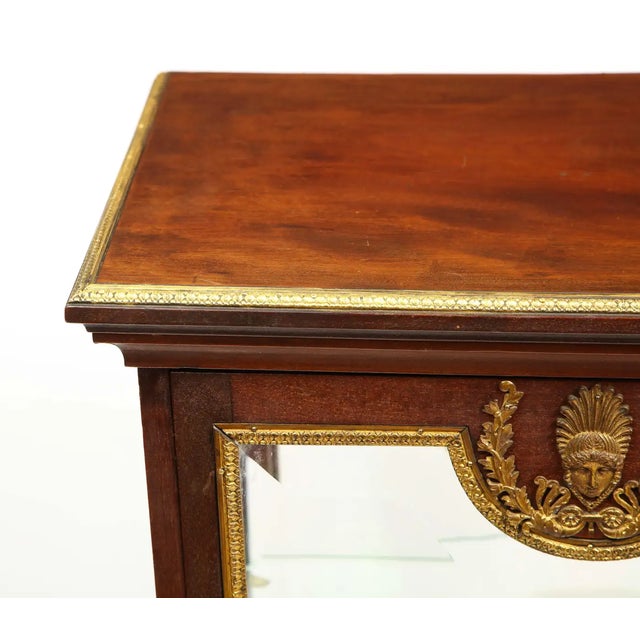 French Empire ormolu-mounted vitrine cabinet pedestal, circa 1840. Very good quality bronze mounts of typical Empire...