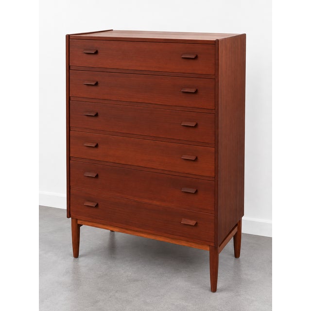 Elegant Danish Mid-Century Modern high chest of drawers, attributed to Poul Volther, dating from the 1960s. The chest...