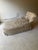 Vintage upholstered chaise lounge with tufted back and full flat pleat skirt. Current upholstery is a silk blend. No nicks...