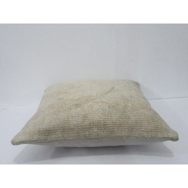 Decorative pillow cover made from a vintage Turkish handknotted rug. Backed with good quality cotton fabric. Pillow...