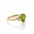 Celebrate the refreshing beauty of nature with this exquisite pear-cut peridot bypass ring. Featuring a striking lime-...