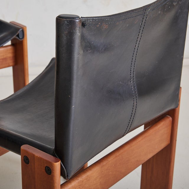 A set of four Italian 'Monk' dining chairs by Afra & Tobia Scarpa for Molteni. Designed in 1974, the Monk chair is one of...